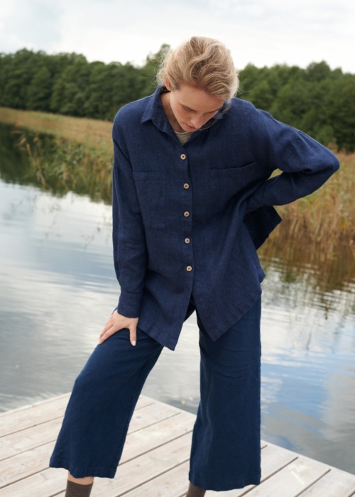 A model in navy blue wool linen blend button down