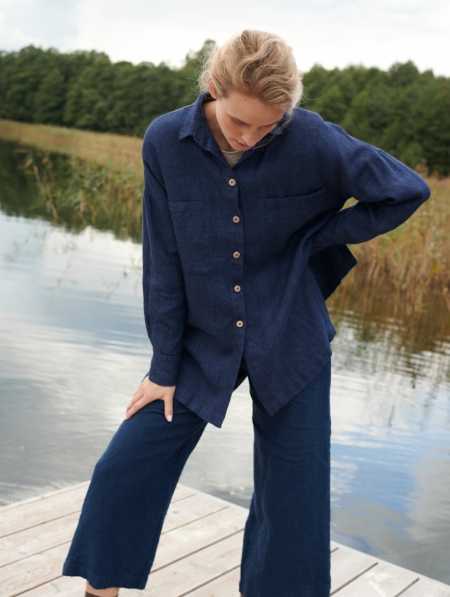 A model in navy blue wool linen blend button down