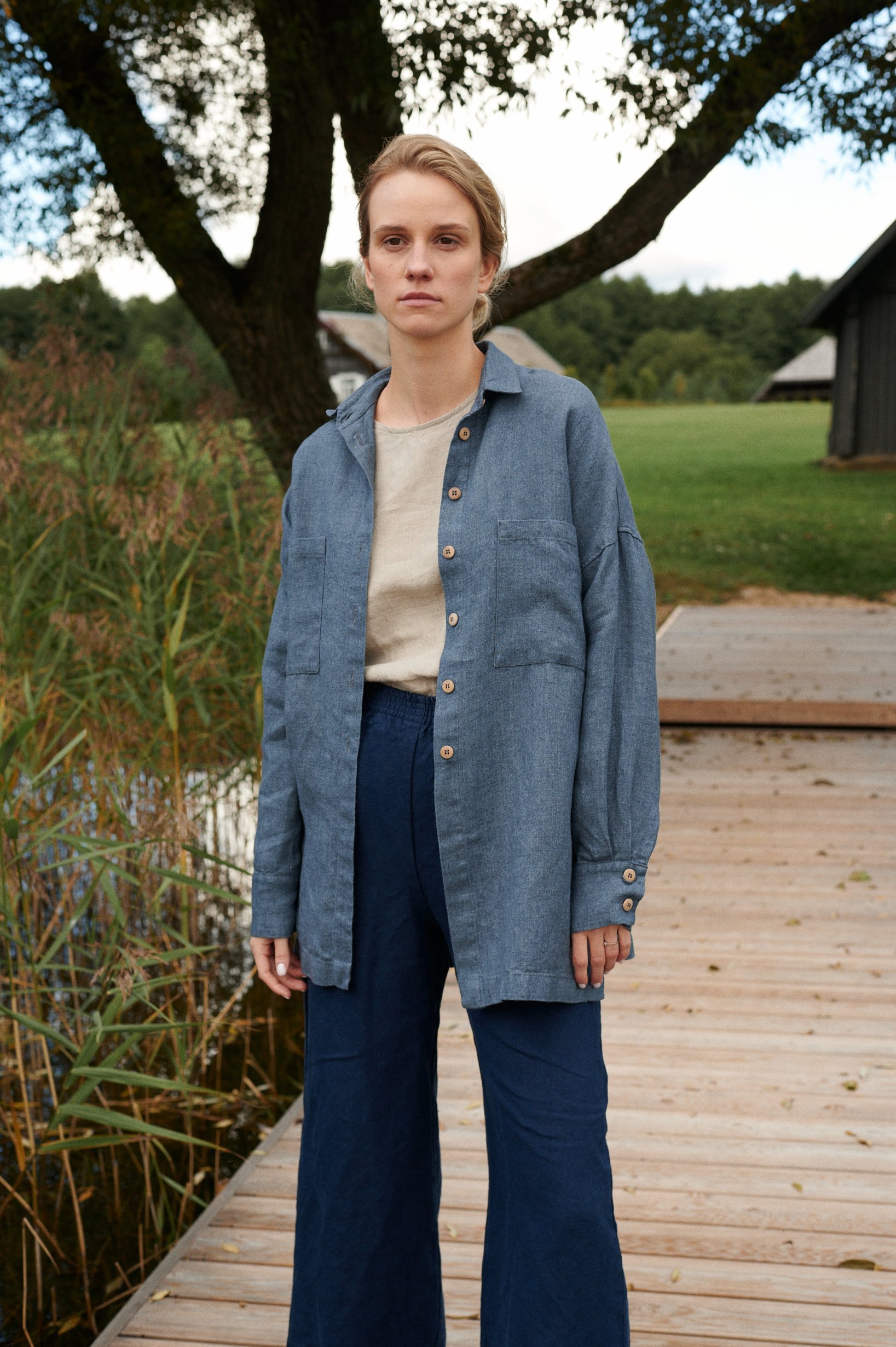 A model wearing oversized linen wool blend shirt in blue