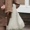 Handbag from heavy linen in natural grey color