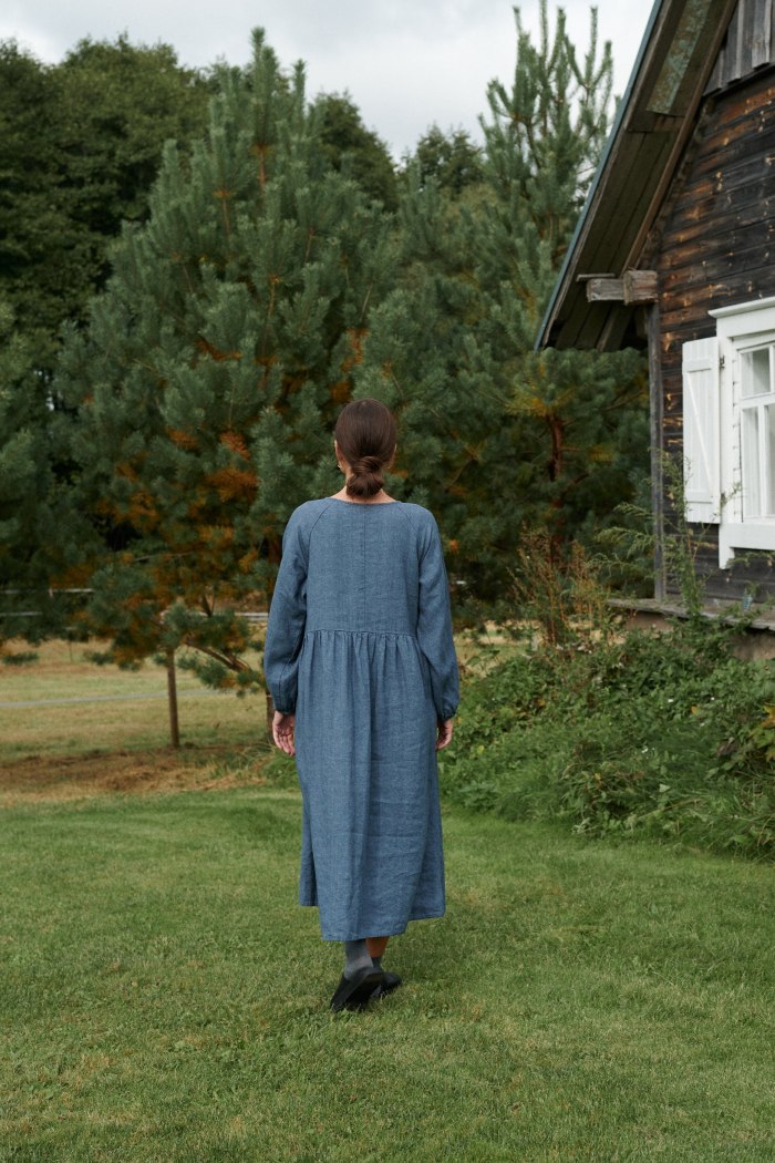 The back of long blue wool linen dress