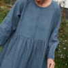 Woman in linen wool blend smock dress
