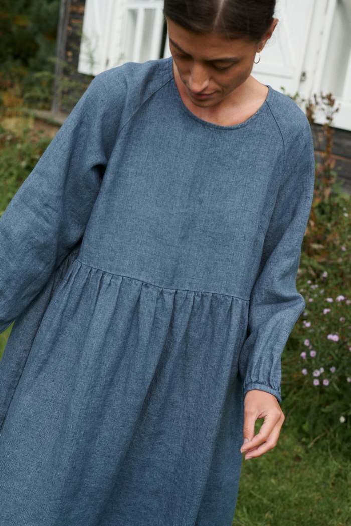 Woman in linen wool blend smock dress