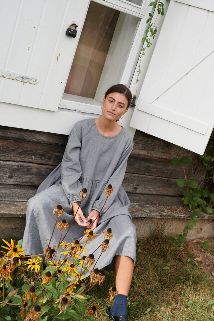 A model wearing oversized linen dress in grey linen wool blend