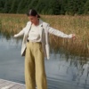 A model wearing barrel leg heavy linen pants