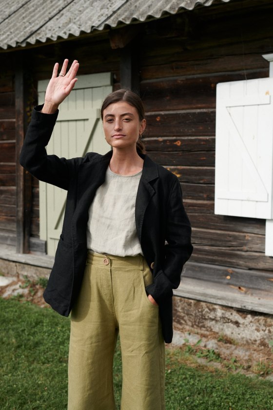 Heave linen blazer in black paired with olive linen pants