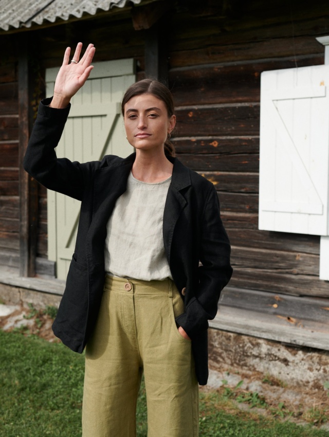 Heave linen blazer in black paired with olive linen pants