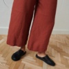 Bottom part of a wide-leg cropped heavy linen trousers