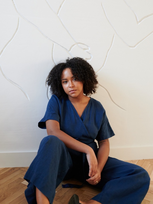 Navy blue linen jumpsuit with dropped shoulders and a V-neck