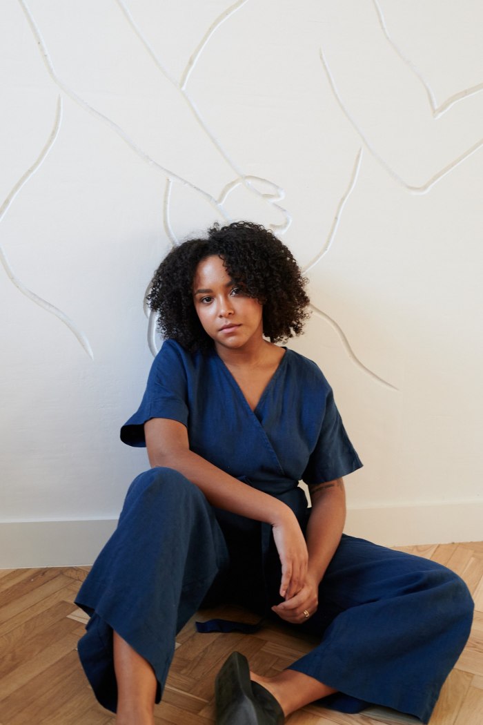 Navy blue linen jumpsuit with dropped shoulders and a V-neck