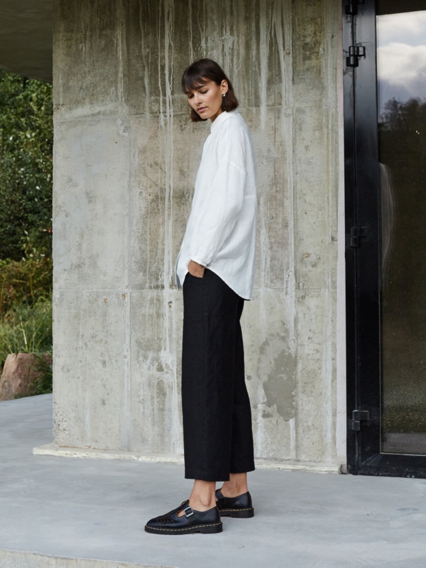 A model wearing heavy linen black trousers