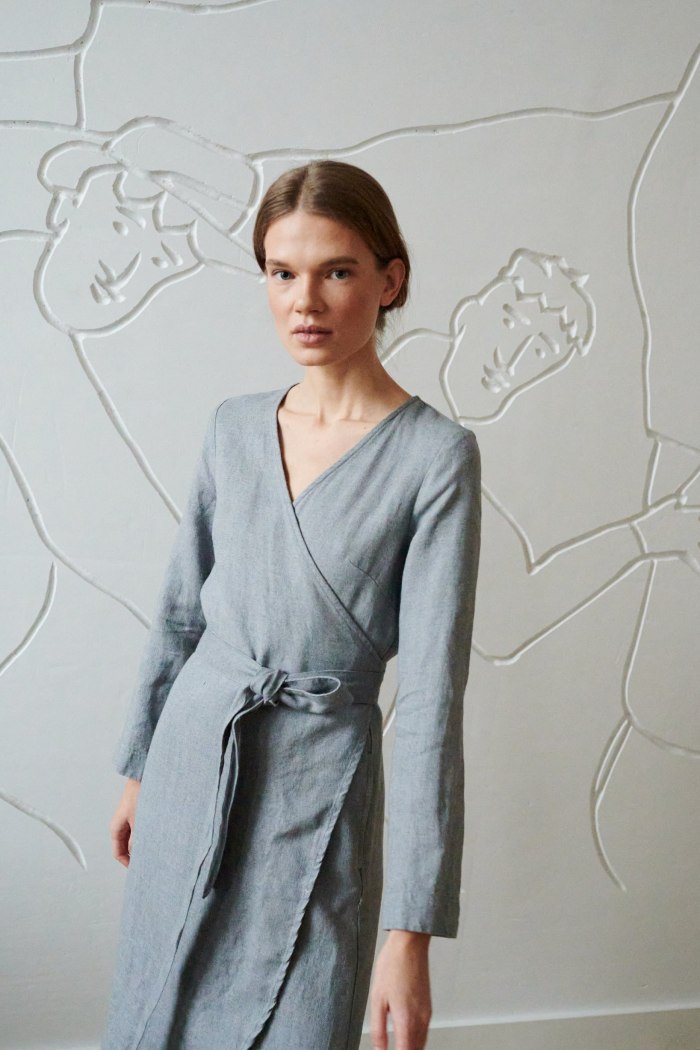 Model wearing sustainable wool dress