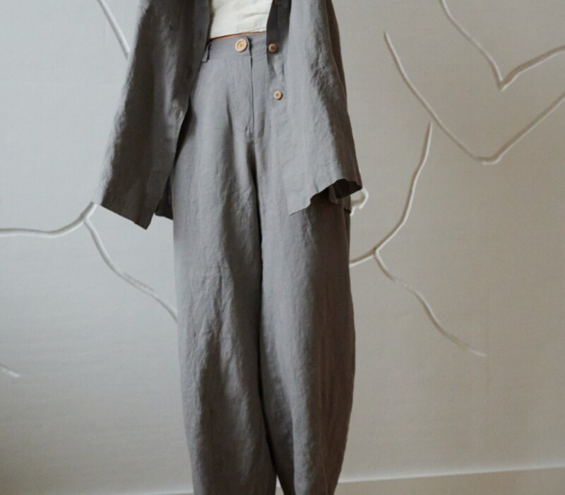 oversized linen barrel leg pants and a matching shirt in neutral grey