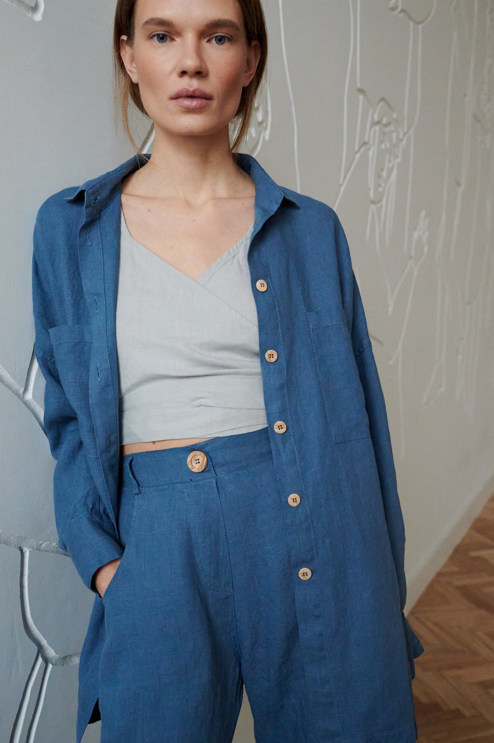 opened linen blue oversized button down with grey top