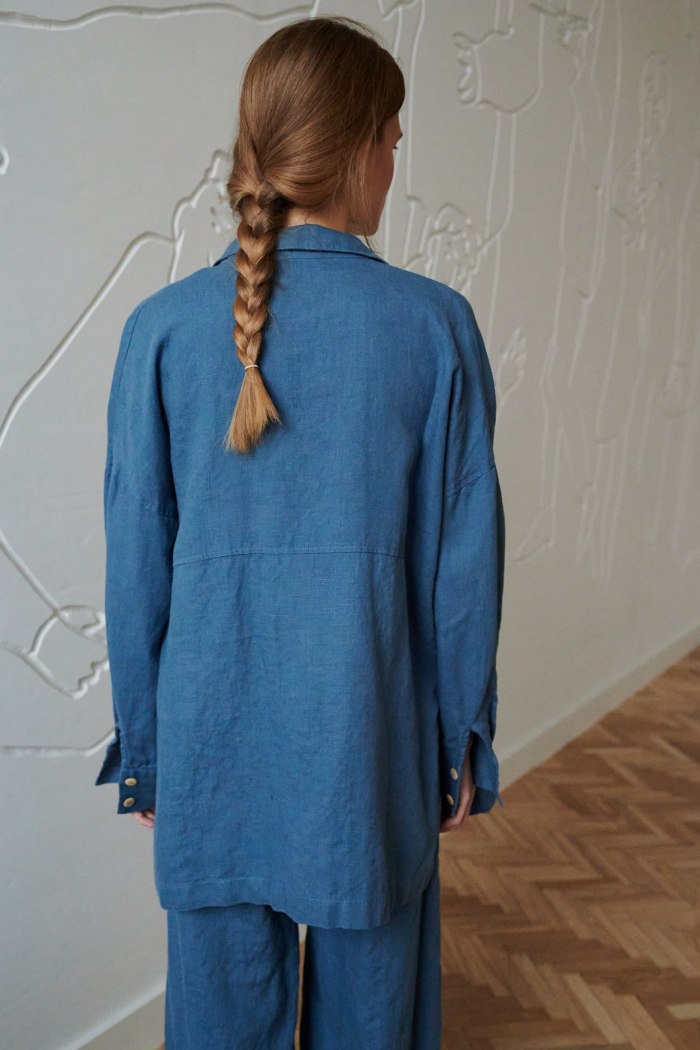 the back of dropped shoulder oversized linen button down