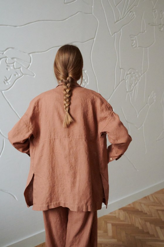 the back of oversized linen button down with side slits