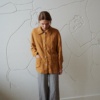 A relaxed fit linen jacket with buttoned cuffs paired with wide-leg linen trousers