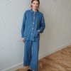 A relaxed fit utility linen jacket and wide-leg linen trousers outfit