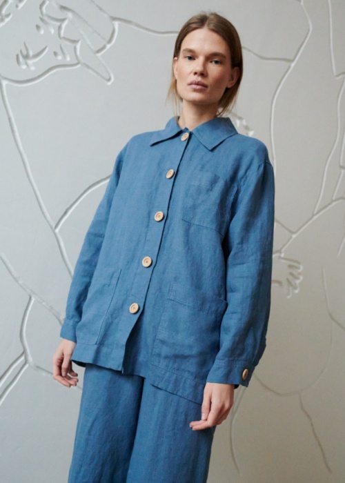 A blue relaxed fit linen jacket with wooden buttons