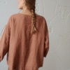 Back of a linen tunic with three-quarter sleeves
