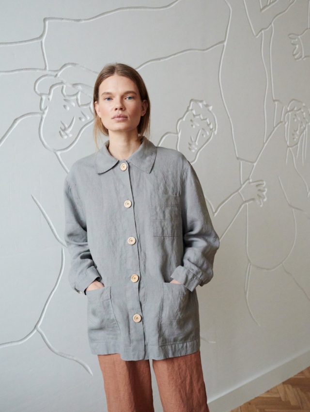 Linenfox model in an oversized linen jacket with patch pockets and wooden buttons