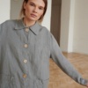 A relaxed fit linen jacket with wooden buttons
