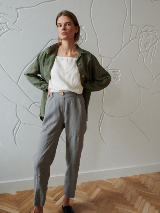 High-waisted linen pants with a linen top tucked in and a flowy linen shirt on top