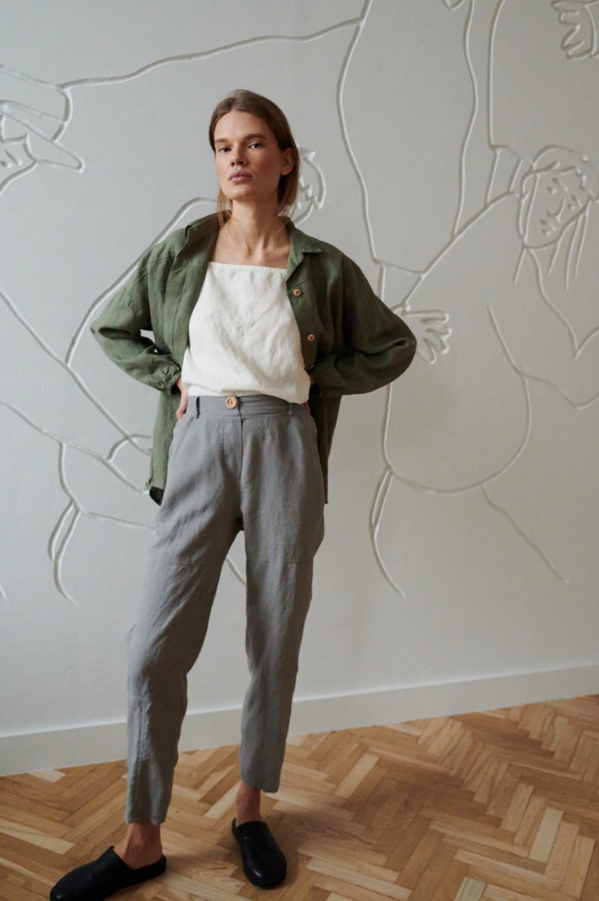 High-waisted linen pants with a linen top tucked in and a flowy linen shirt on top