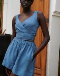 women wearing wide leg blue linen shorts