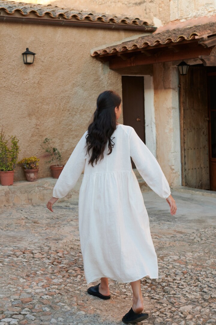 model wearing Margo maxi white linen dress