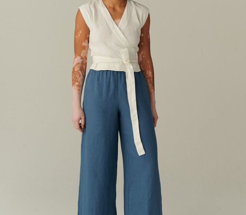 women is wearing wide-leg blue linen pants