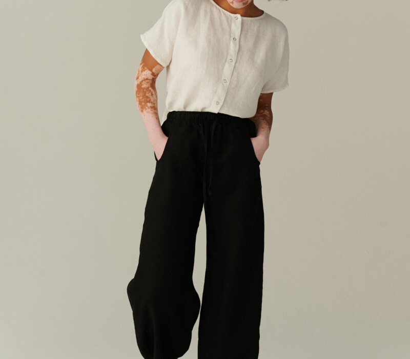 women wearing black linen drawstring pants