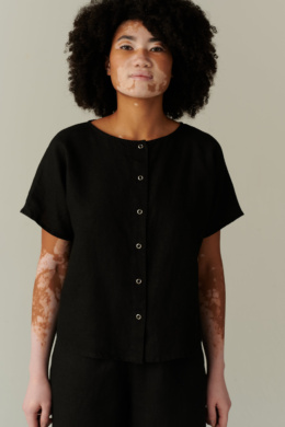 Relaxed fit black linen top with snap buttons