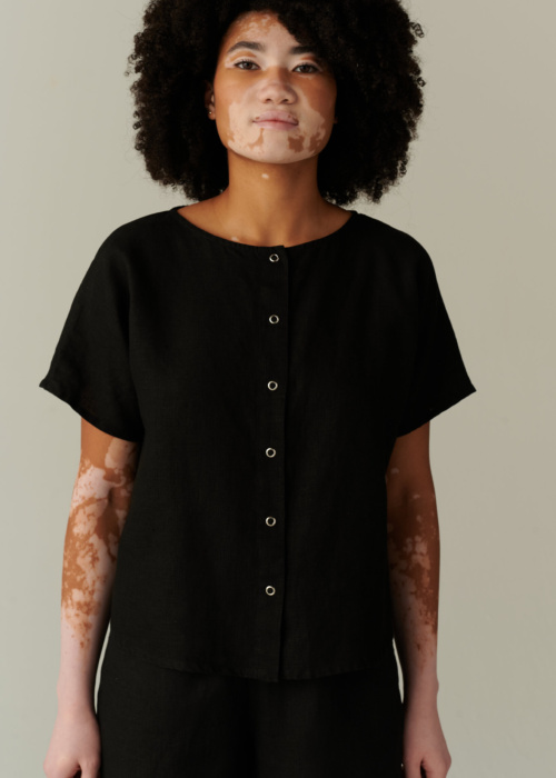 Relaxed fit black linen top with snap buttons