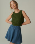 women is wearing summer mini skirt in stellar blue linen