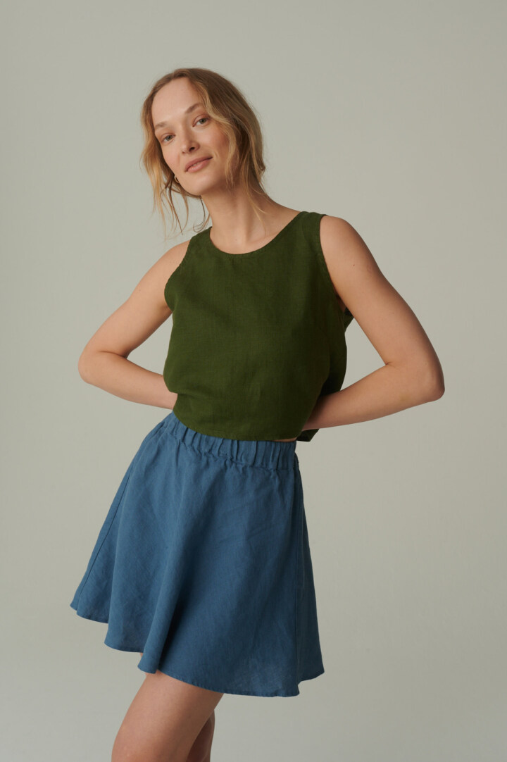 women is wearing summer mini skirt in stellar blue linen