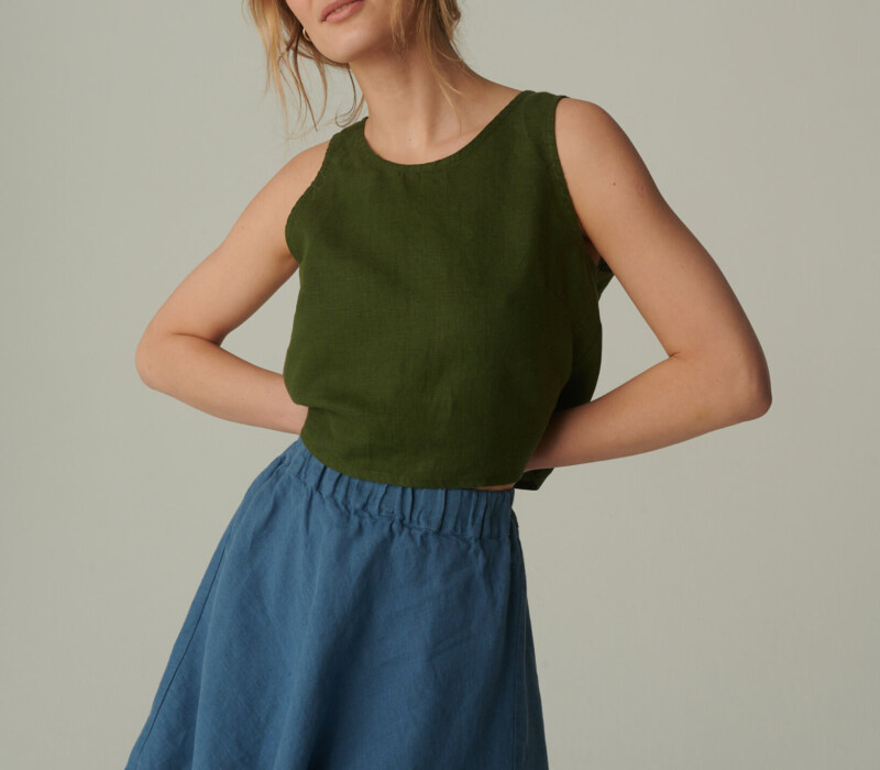 women is wearing summer mini skirt in stellar blue linen