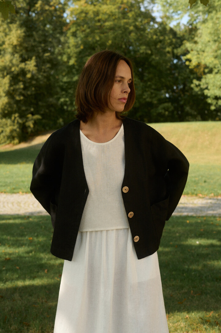model is wearing black linen jacket from linenfox