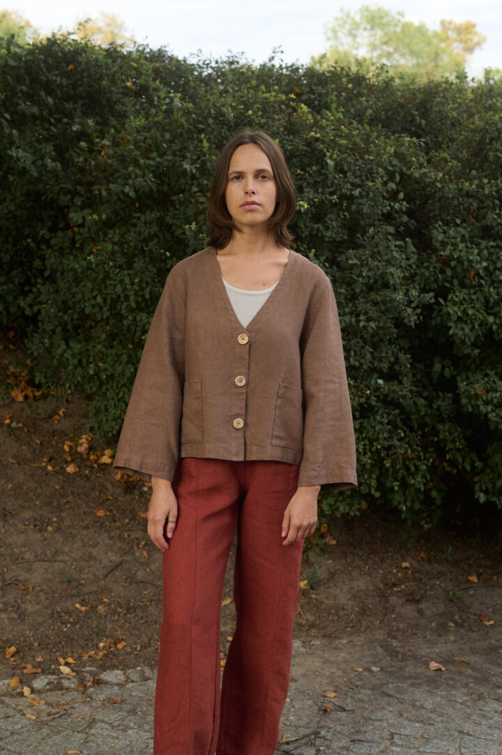 model is wearing cropped linen jacket from linenfox