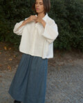 model is wearing wool maxi skirt