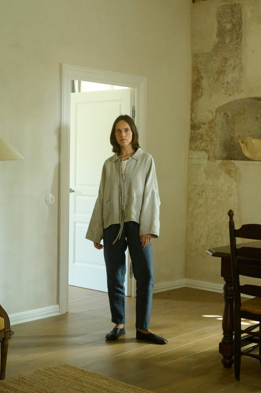 Model in an oversized heavy linen jacket and trousers outfit