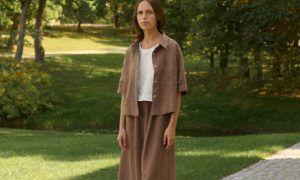 model is wearing brown linen skirt