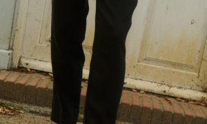 Black slightly cropped medium linen tapered leg trousers
