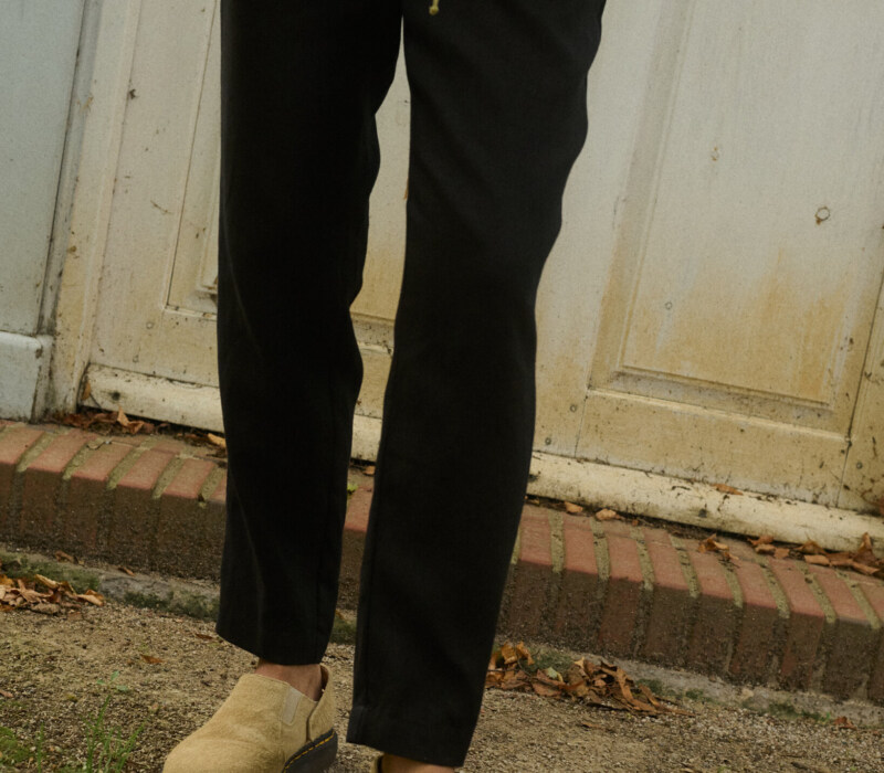 Black slightly cropped medium linen tapered leg trousers