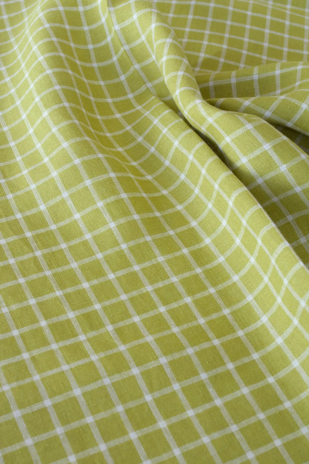close-up of natural pickle checks olive linen fabric