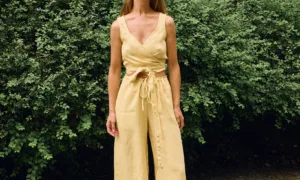 Butter linen two-piece set featuring a wrap crop top and wide-leg trousers, breathable women’s linen outfit