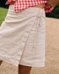White cotton-linen blend mini wrap skirt with adjustable waist ties