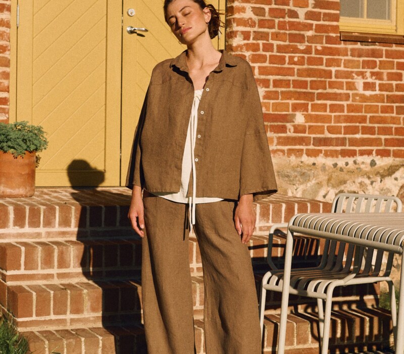 Cacao oversized linen shirt with shell buttons styled with matching high-waisted trousers