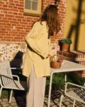 Side view of butter yellow linen shirt with relaxed oversized fit styled with natural cotton-linen pants