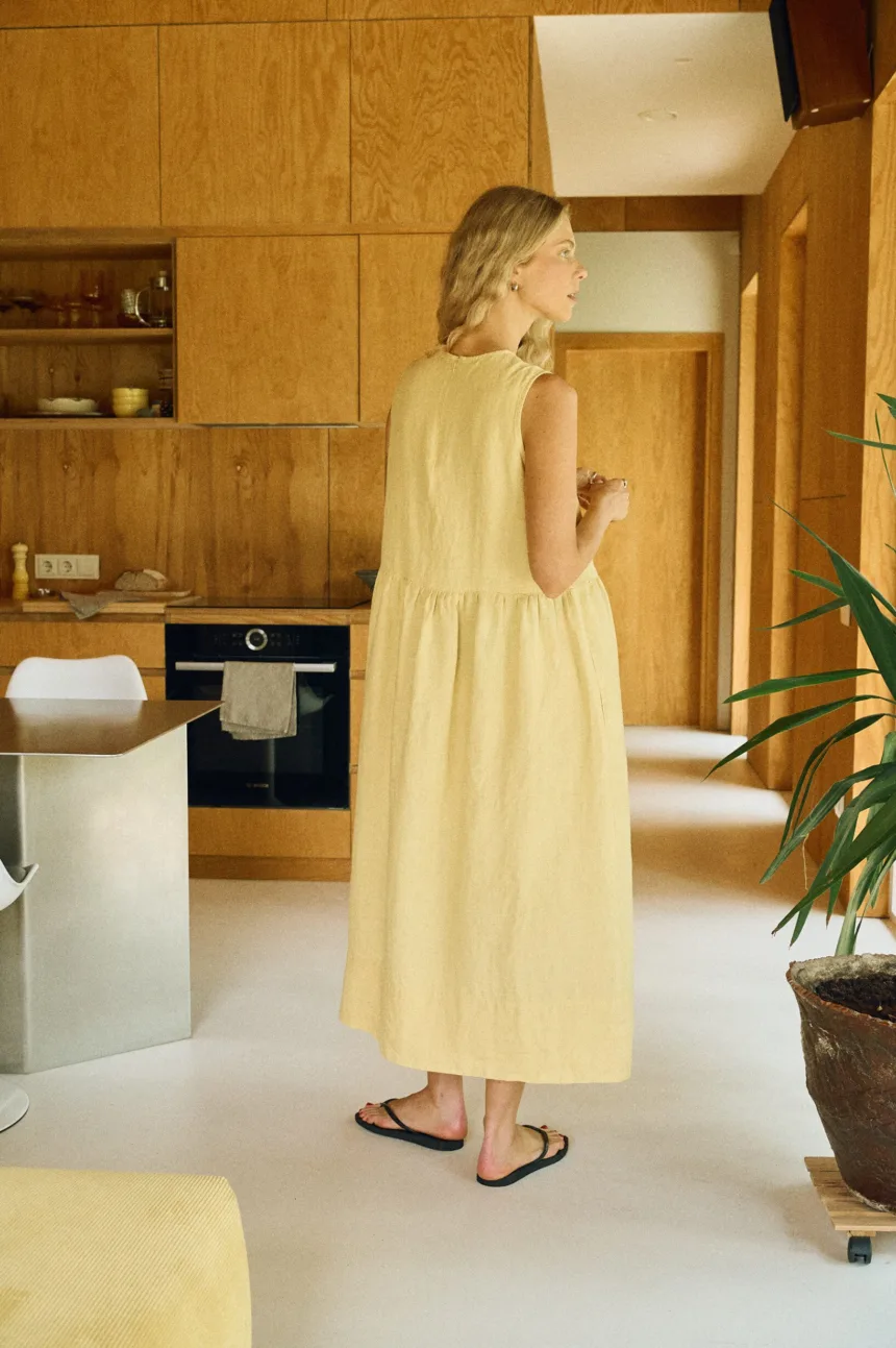 Butter yellow linen sleeveless dress back view with discreet zipper